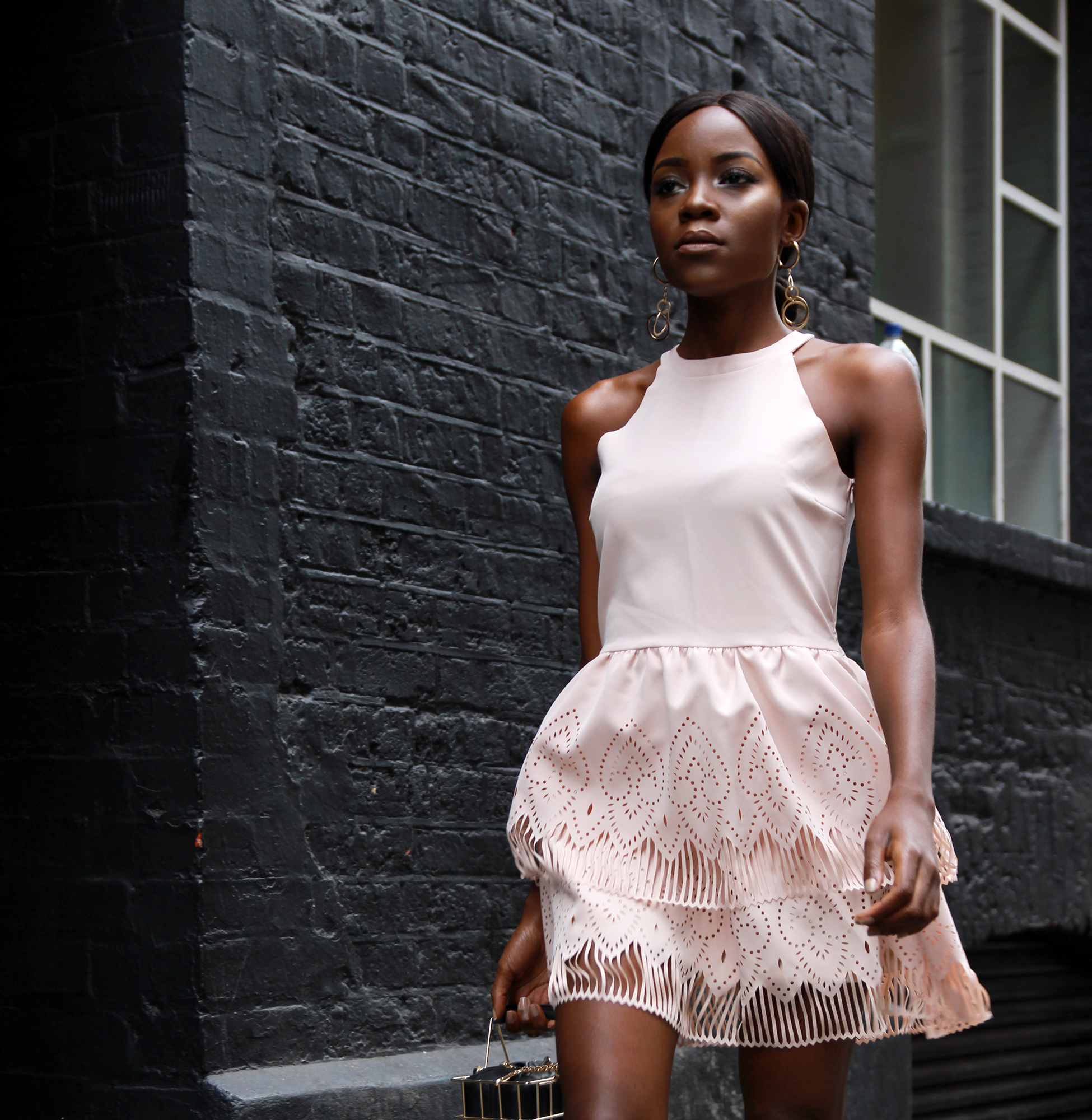 perfect pink summer dress for an evening out with laser cut details
